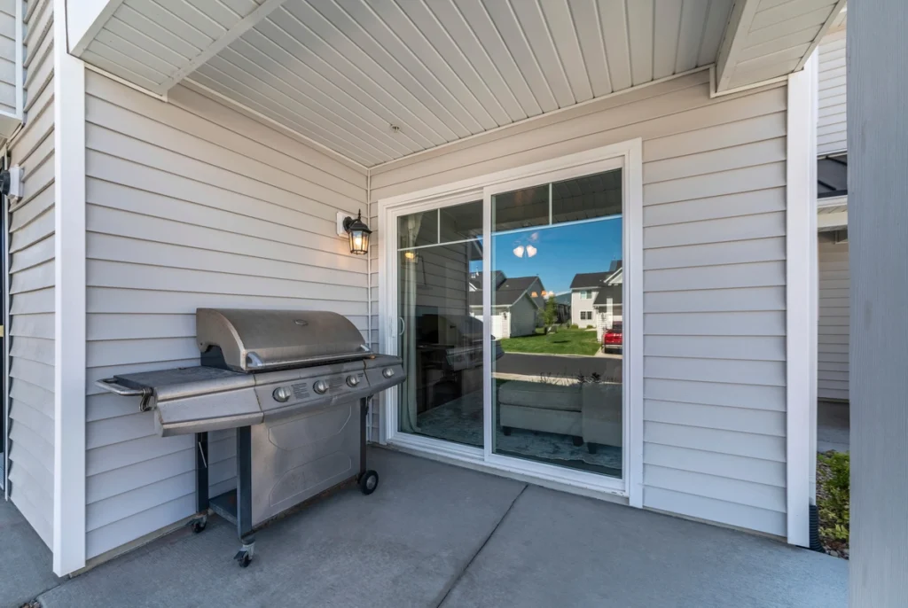 closeup of home with LP Smartside siding installed in white color
