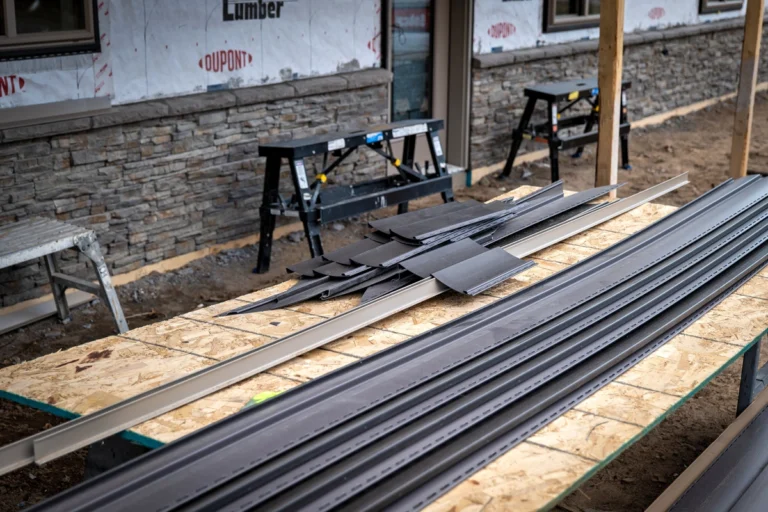 close up of how to cut vinyl siding with pieces laid out
