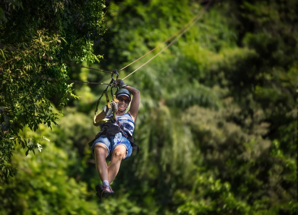 woman goes zip lining at go ape in indianapolis