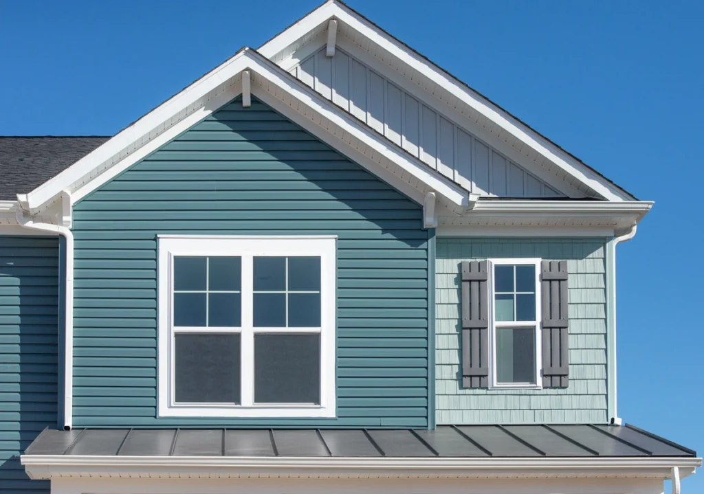 green siding on house